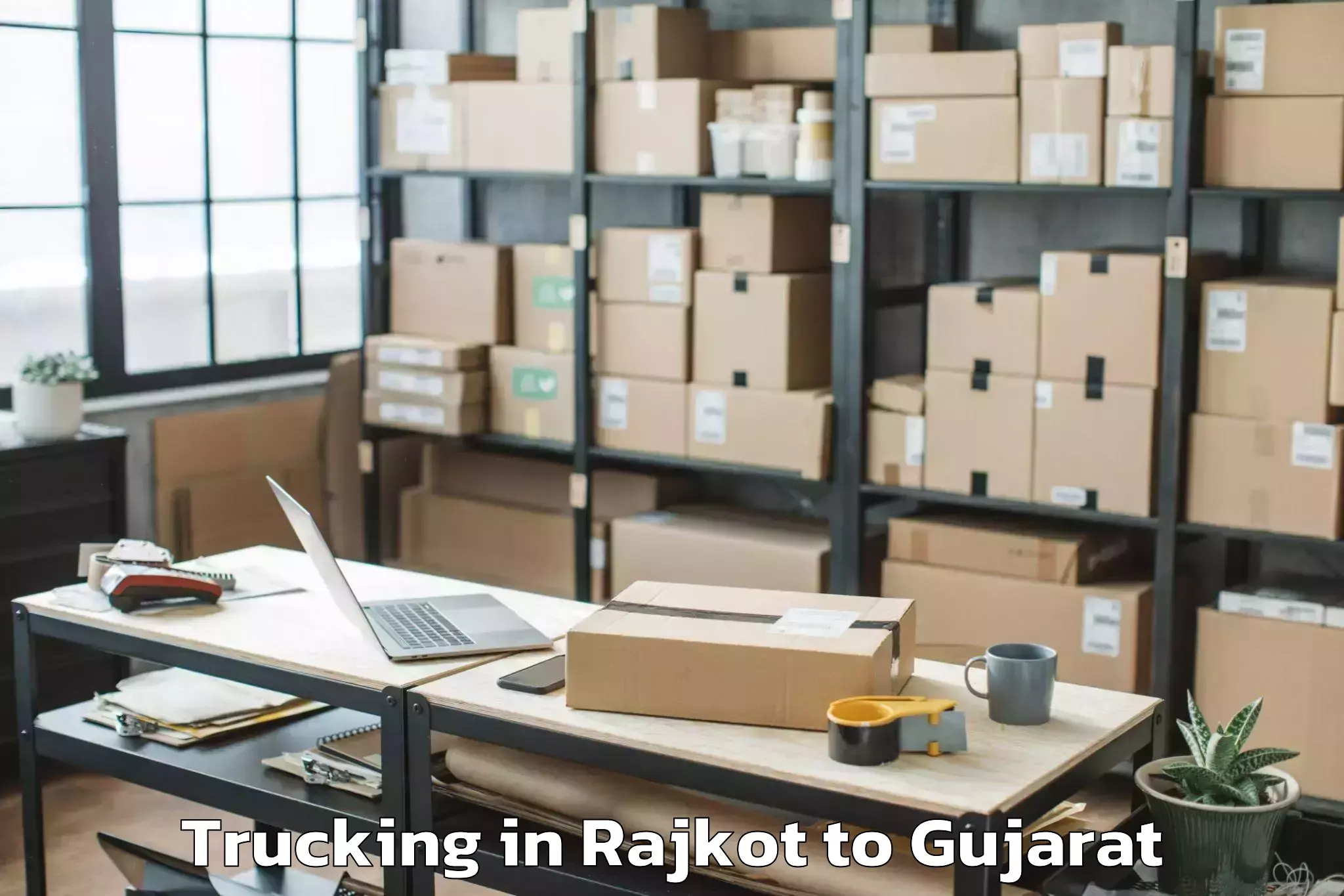 Reliable Rajkot to Anand Agricultural University Trucking